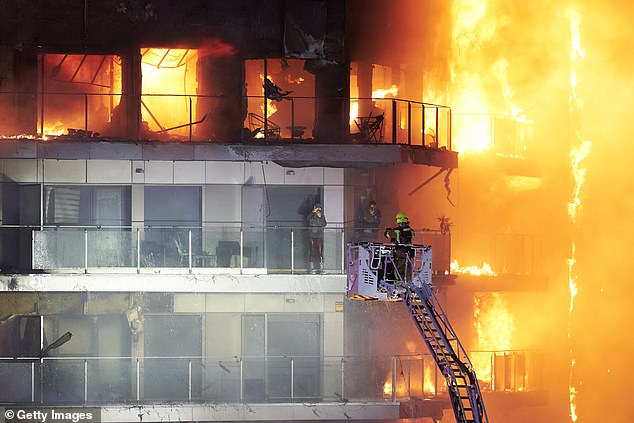 Four dead, 20 more feared killed as fire engulfs apartment block in Spain