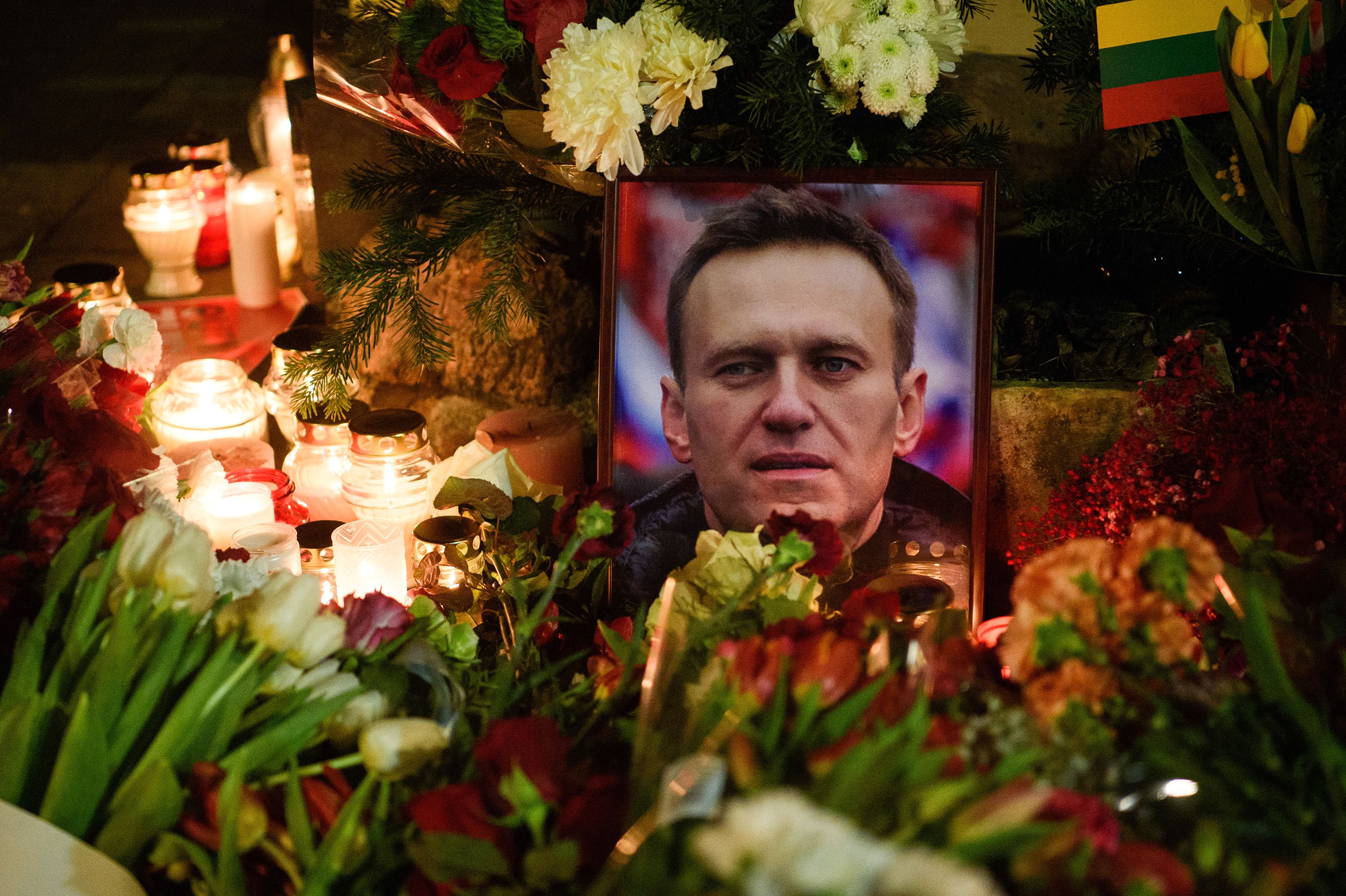 Russia begins jailing hundreds of protesters for laying flowers and candles in memory of 