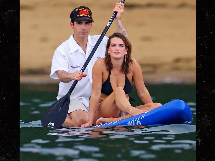 Singer Joe Jonas paddle boards with rumoured girlfriend Stormi Bree in Australia