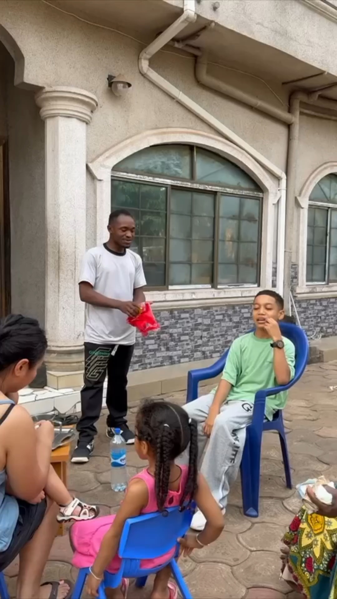 Mixed race kid raised abroad is seen speaking fluent Igbo with his grandmother (video)