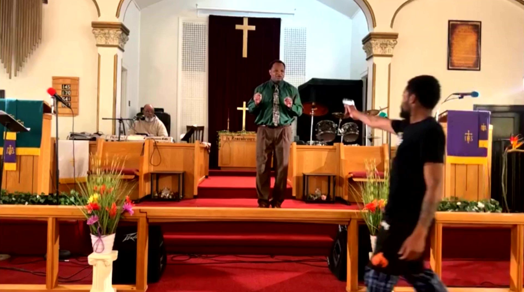 Church service comes to a halt as man pulls gun and attempts to shoot pastor (video)