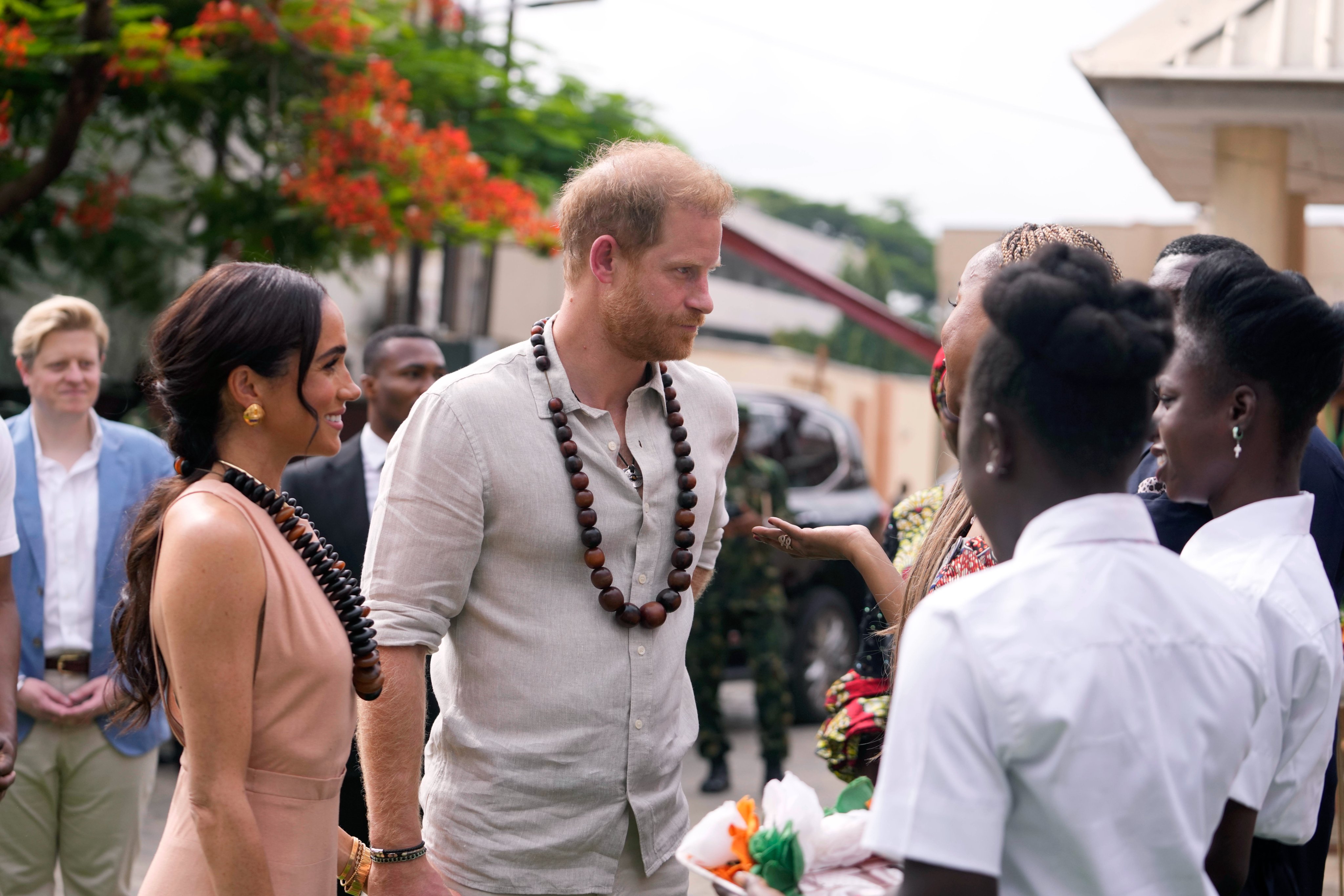 Prince Harry and Meghan Markle visit Abuja school as they arrive Nigeria (photos/video)