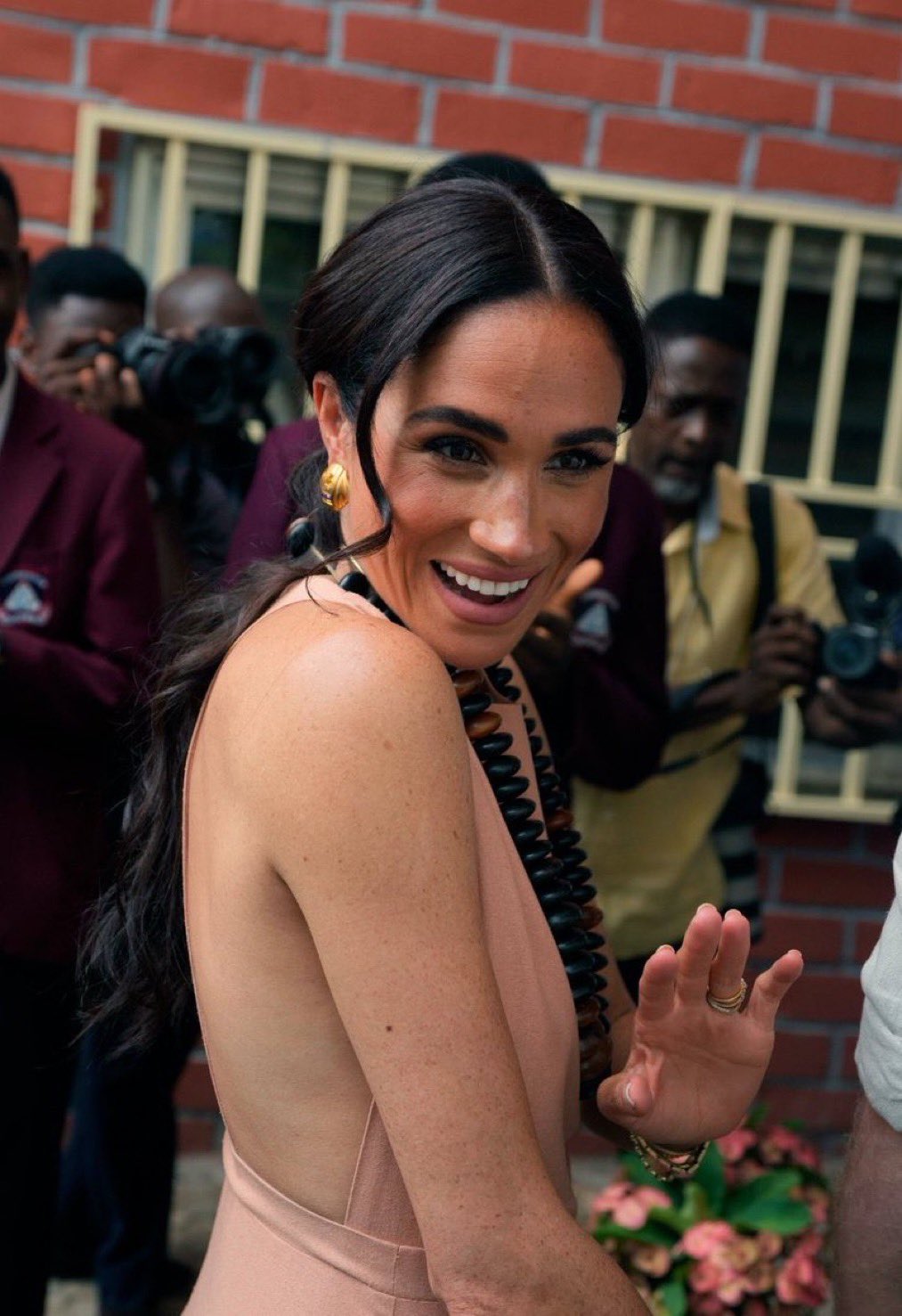 Meghan Markle called out for dressing "inappropriately" to visit a school in Nigeria