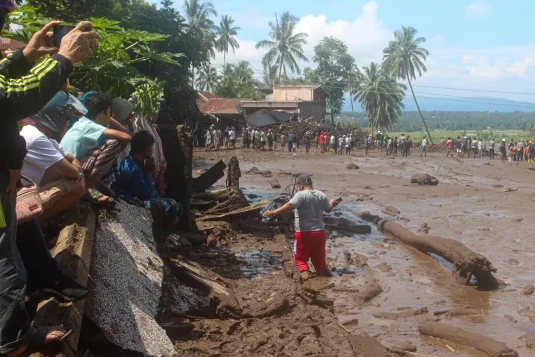 More than 40 dead after cold lava sweeps across village in Indonesia