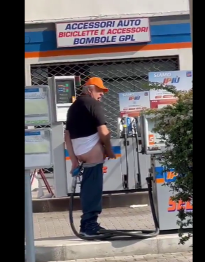 Man caught shoving the nozzle from a petrol pump up his bum while stroking his member at petrol station (+18 video)