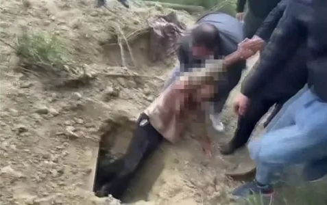 Man buried alive for 4 days rescued after police hear his muffled cries (video)