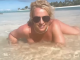 Britney Spears shares nude video on the beach as she admits she wants butt injections