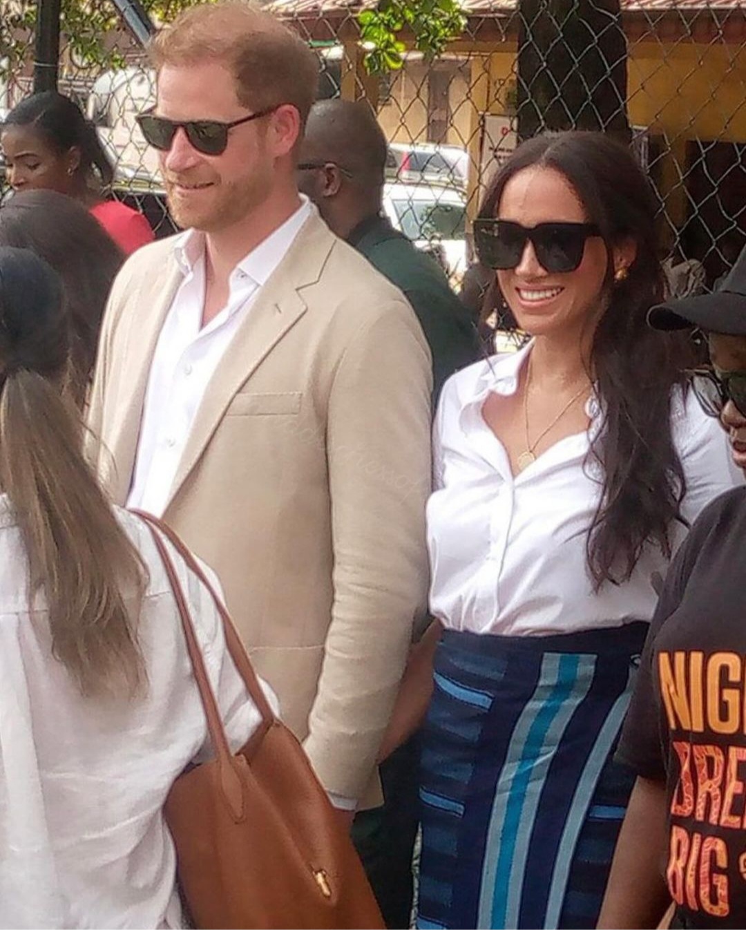 Meghan Markle ties aso oke wrapper as she arrives Lagos with Prince Harry on day 3 of their visit to Nigeria (video)