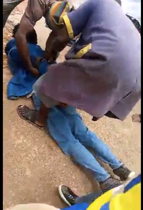 Young man nabbed while allegedly attempting to detonate a bomb in a bank in Jos (video)