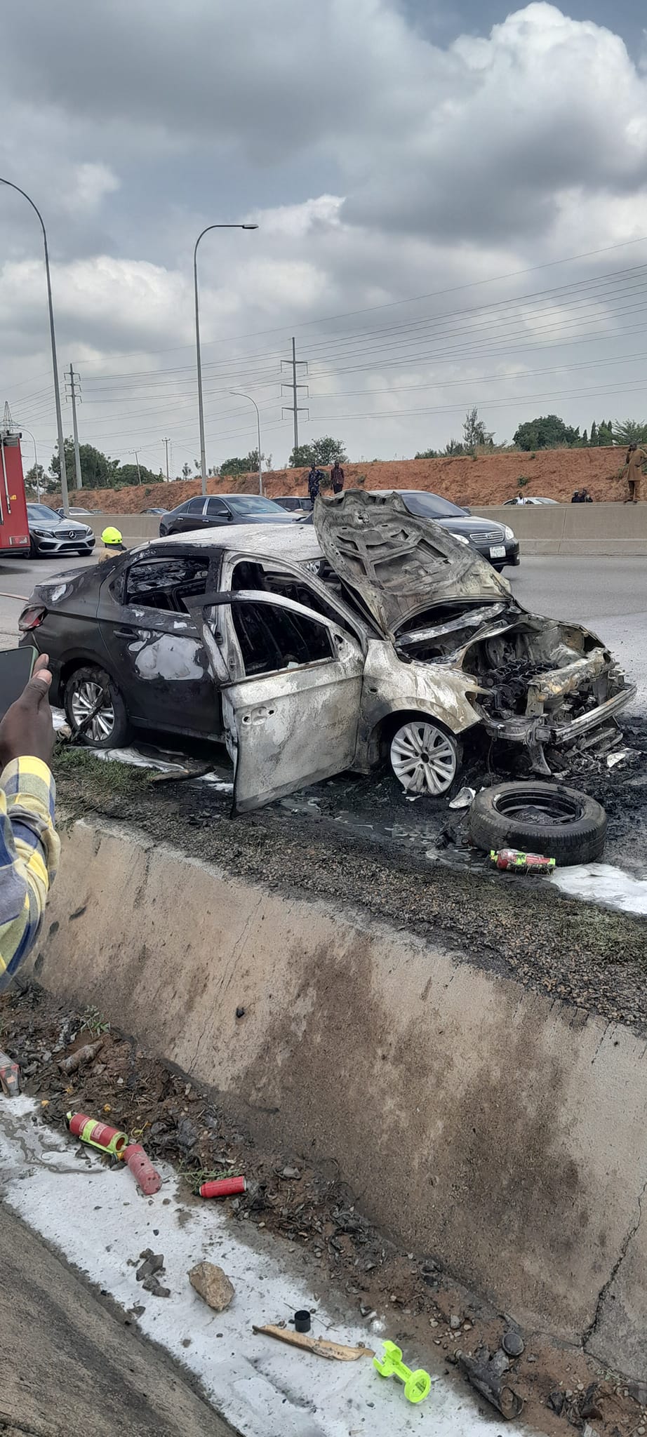 Fire guts car on Abuja airport road (video)