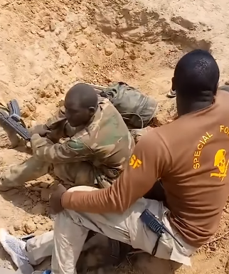 Soldiers weep after losing their colleagues in an attack